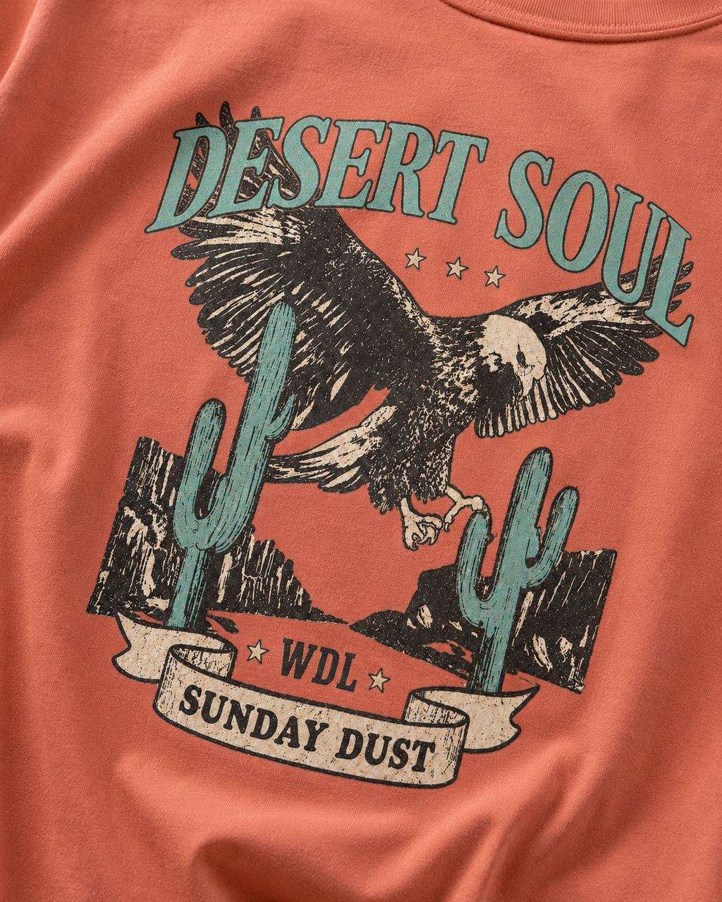 Desert Soul eagle and cactus print close-up in Terracotta