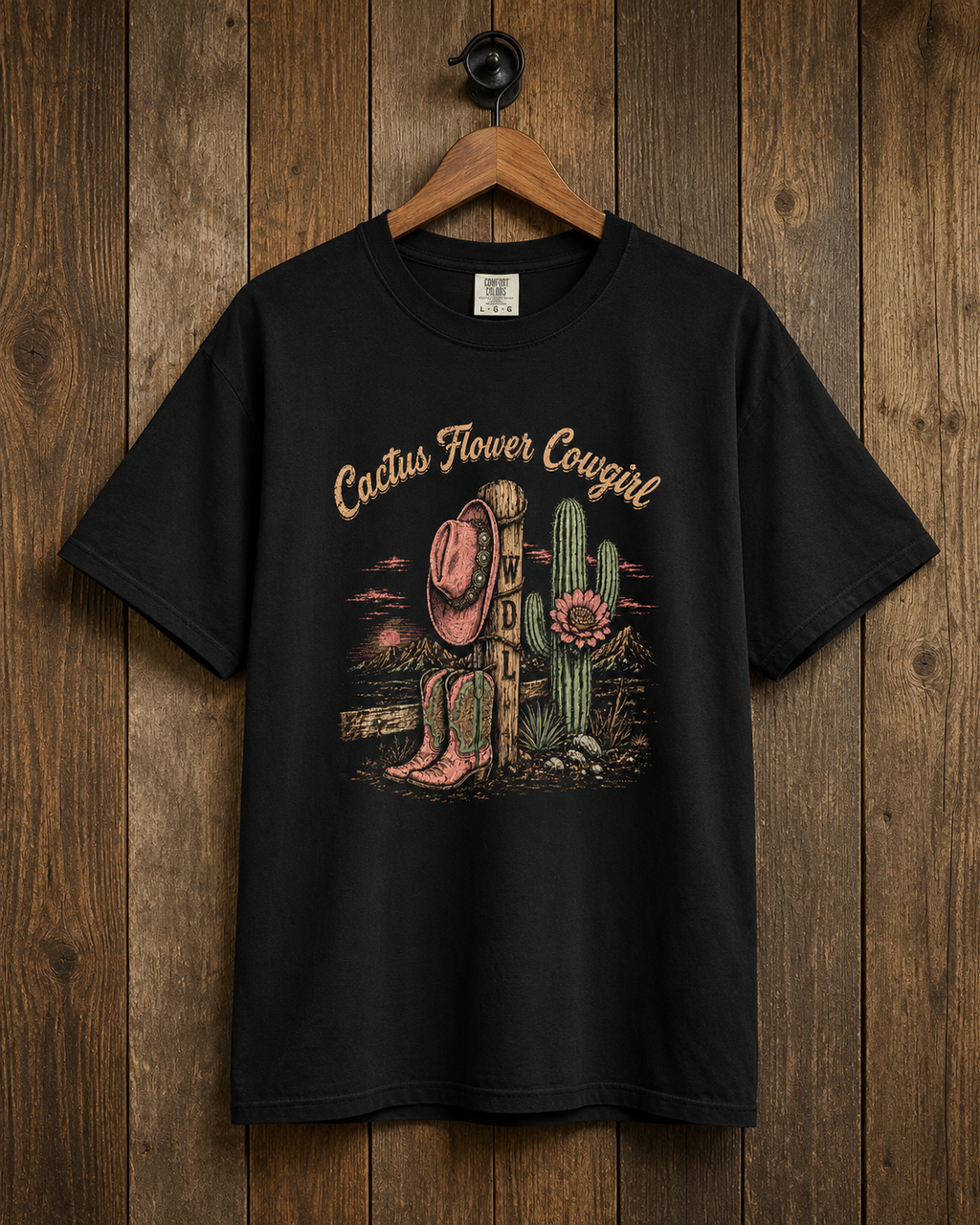 Cactus Flower Cowgirl Tee hanging mockup by Work Don’t Lie Co.